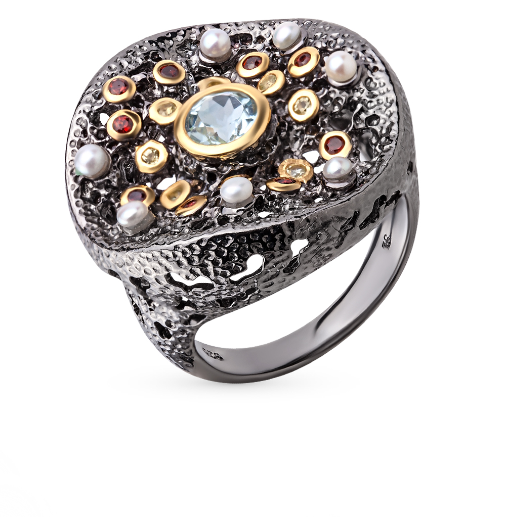 Фото «Серебряное кольцо с жемчугом, гранатом, топазами и хризолитом»